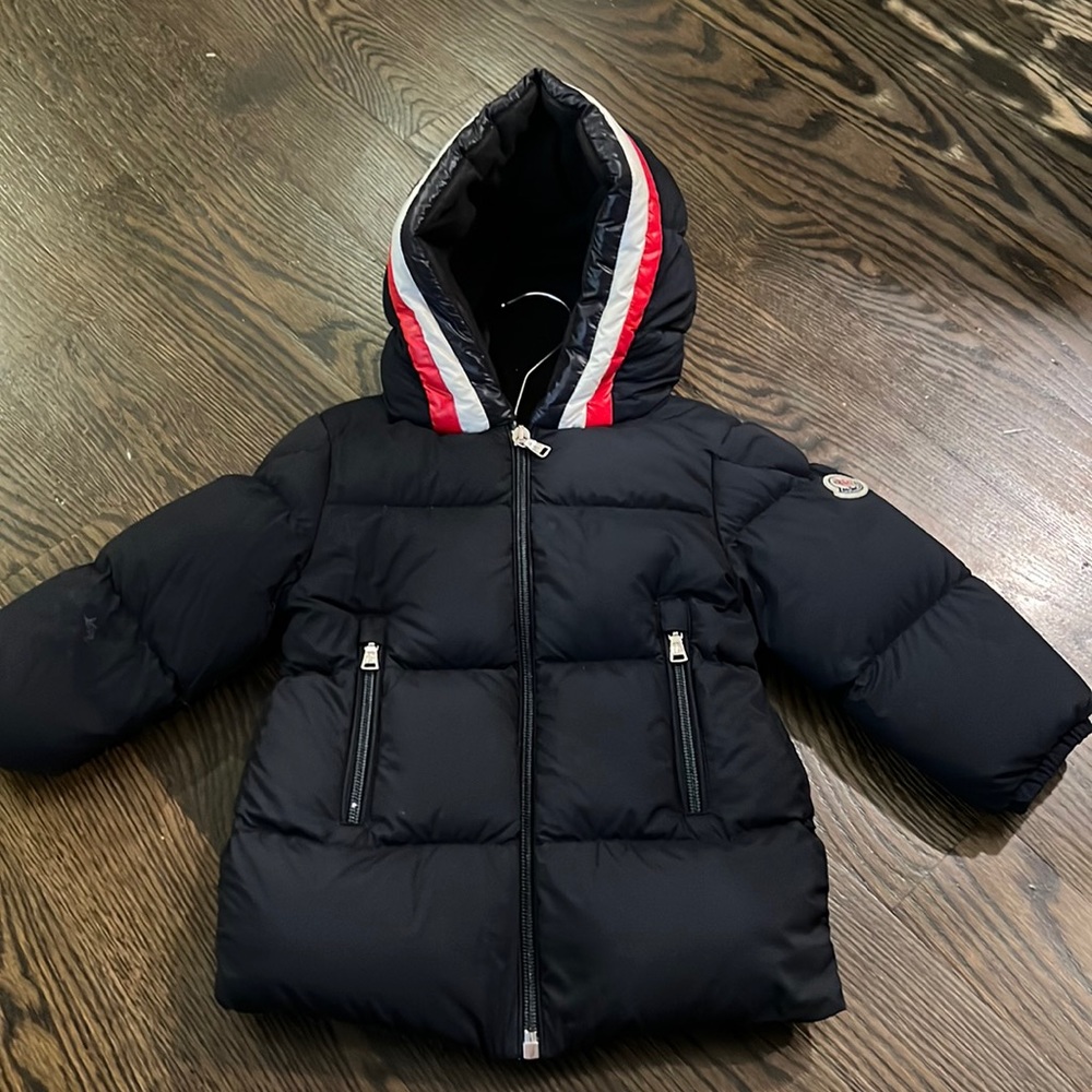 Moncler Toddler 12-18 months navy puffer jacket. Res and white trim on hood.
